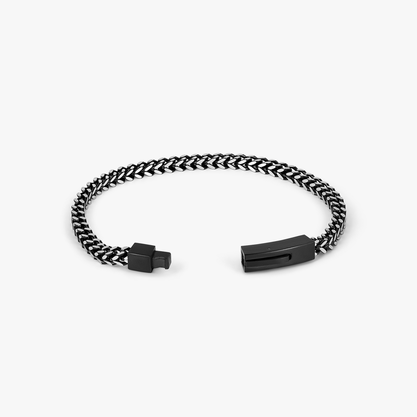 Chevron Click Bracelet In Matte Black with chevron-patterned chain, black IP stainless steel, and matte black clasp.