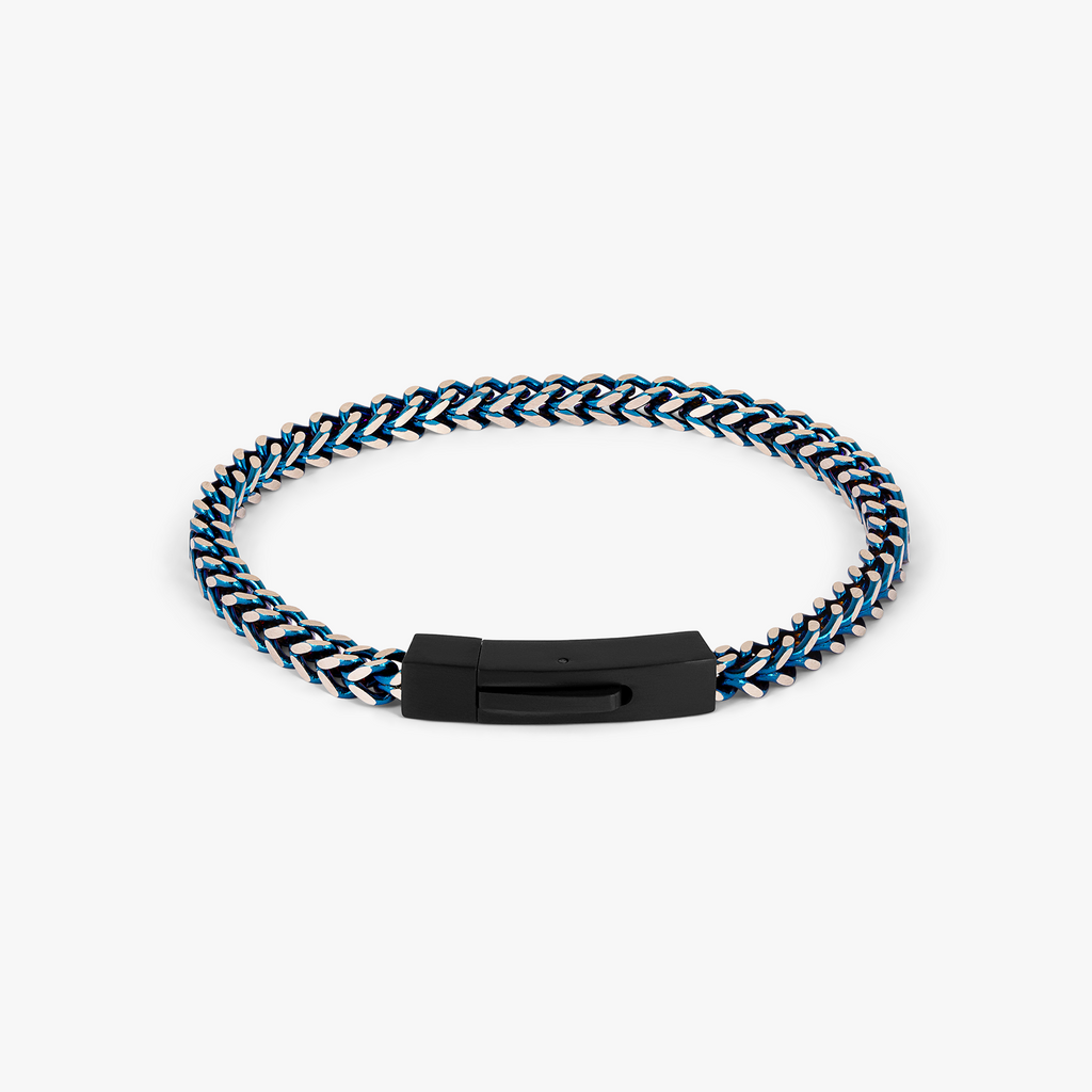 Chevron Click Bracelet In Matte Blue Black with chevron-patterned blue and polished steel links and matte black clasp.