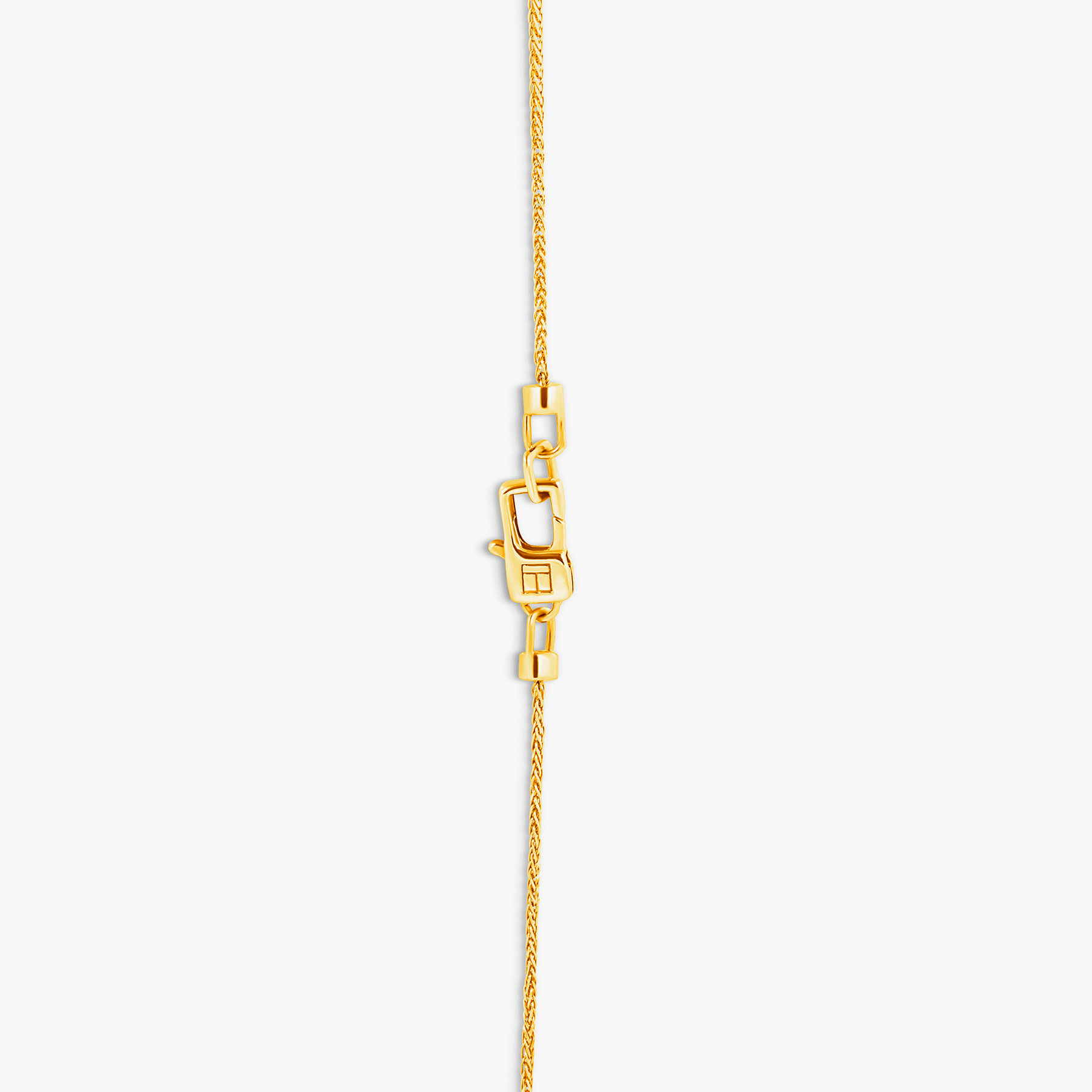 Paros Evil Eye necklace in yellow gold plating with sapphire-set iris, white enamel detail, and box chain.