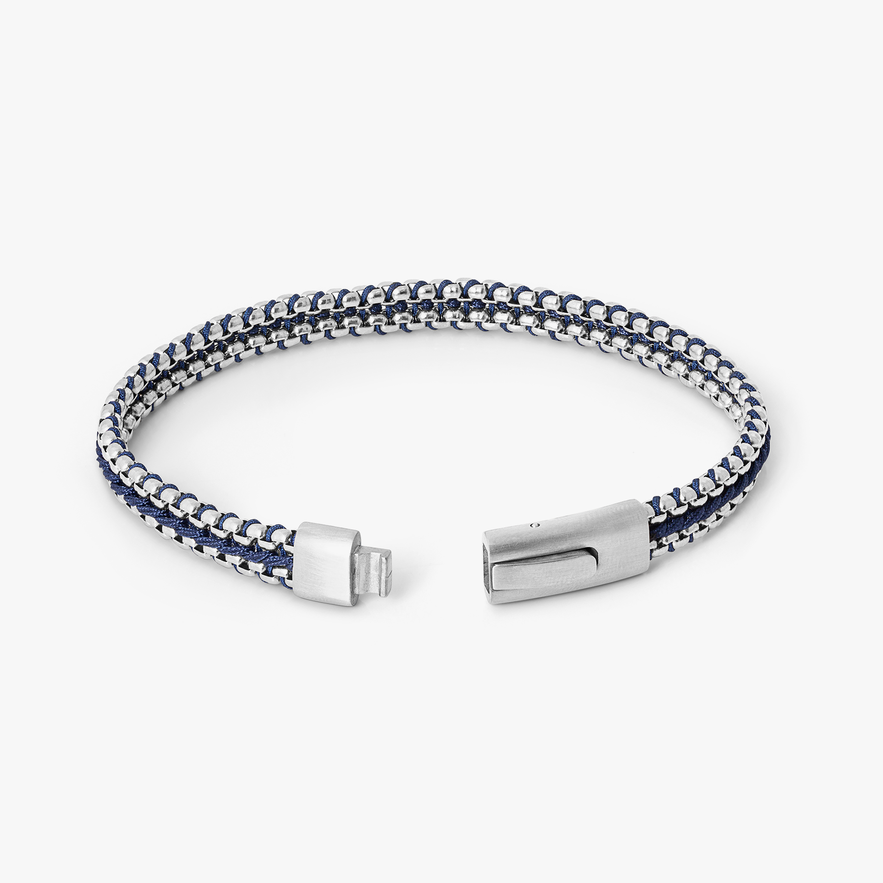 Tris Button bracelet in stainless steel with interlocking chain links, blue thread centre detail, and brushed button clasp.