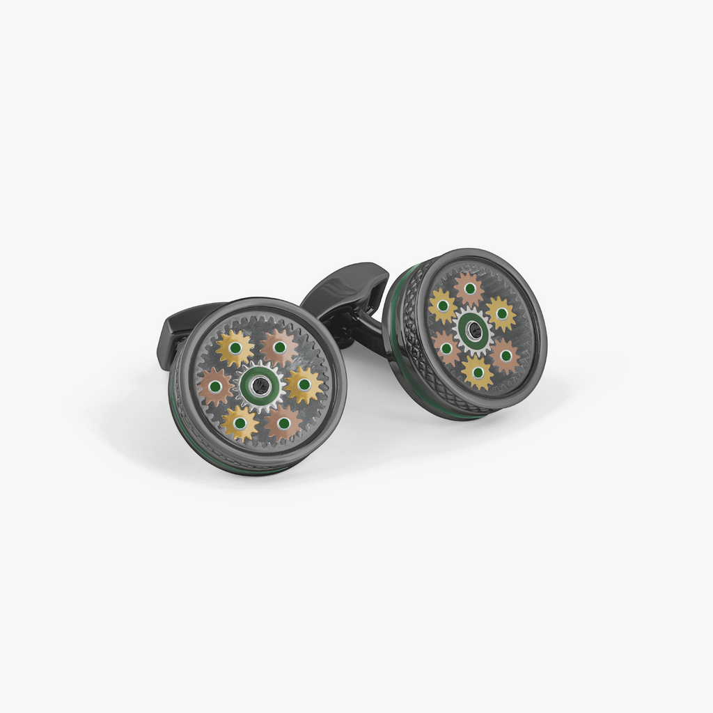 Septa Gear cufflinks in rose and yellow gold tones with grey Alutex, featuring rotating interlocking gears and a central cubic zirconia.