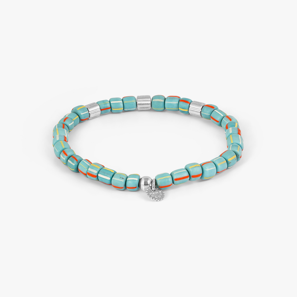 Java Stripes bracelet in rhodium-plated sterling silver with sky blue striped Java glass beads and patterned silver accents.