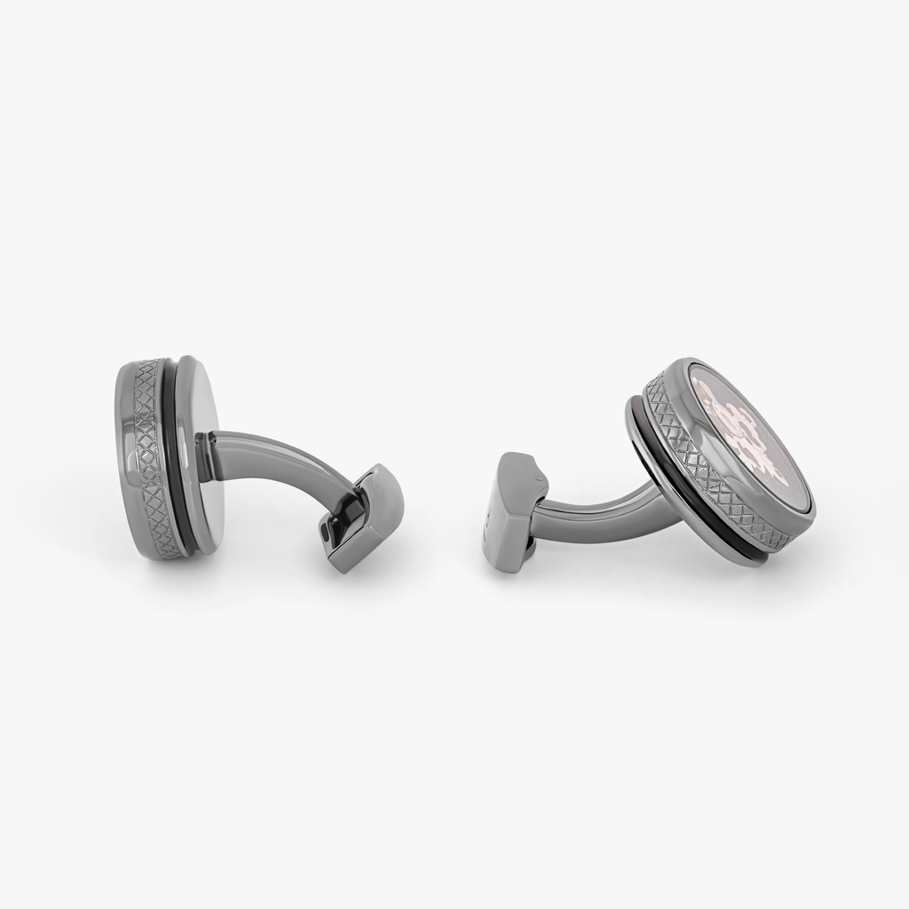 Single tourbillon gear cufflinks in gunmetal with black enamel and moving watch mechanism