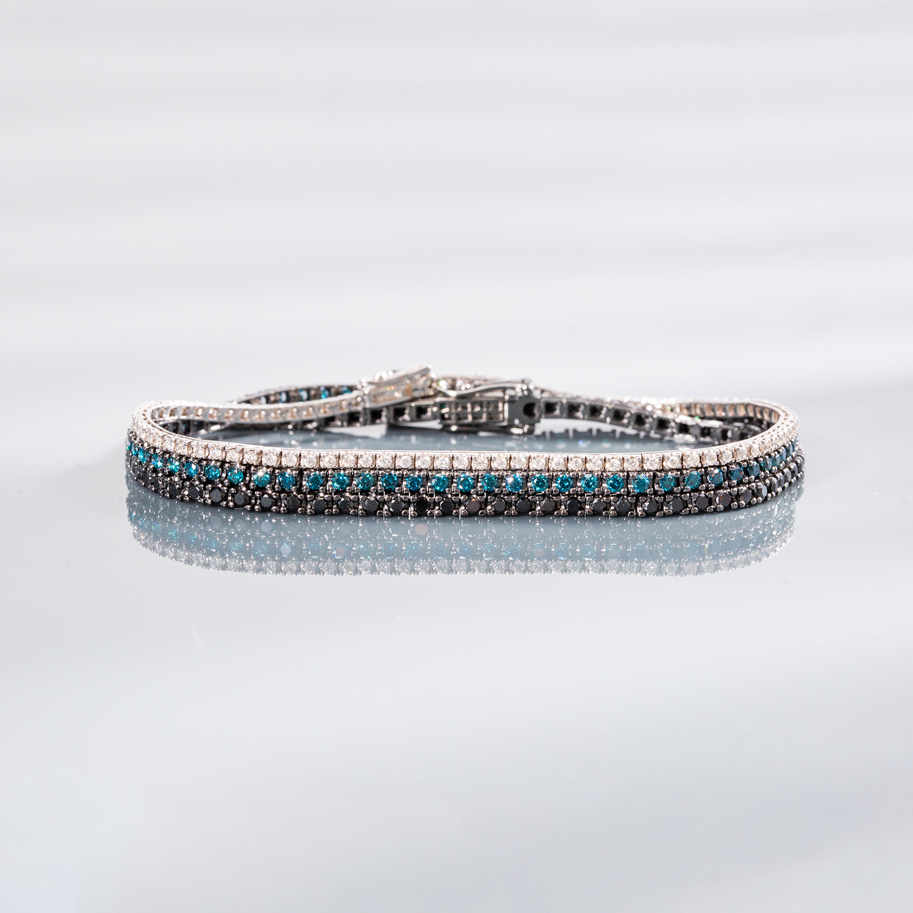 Tennis Bracelet in Black Rhodium Plated 18K White Gold with Black and Blue Diamonds