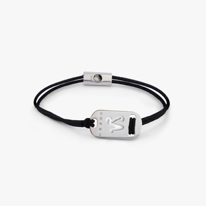 Silver Capricorn bracelet with black cord