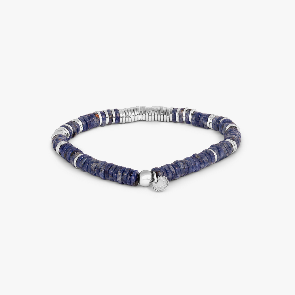 A rhodium-plated sterling silver bracelet with sodalite beads arranged in a pattern that resembles a starry night sky.