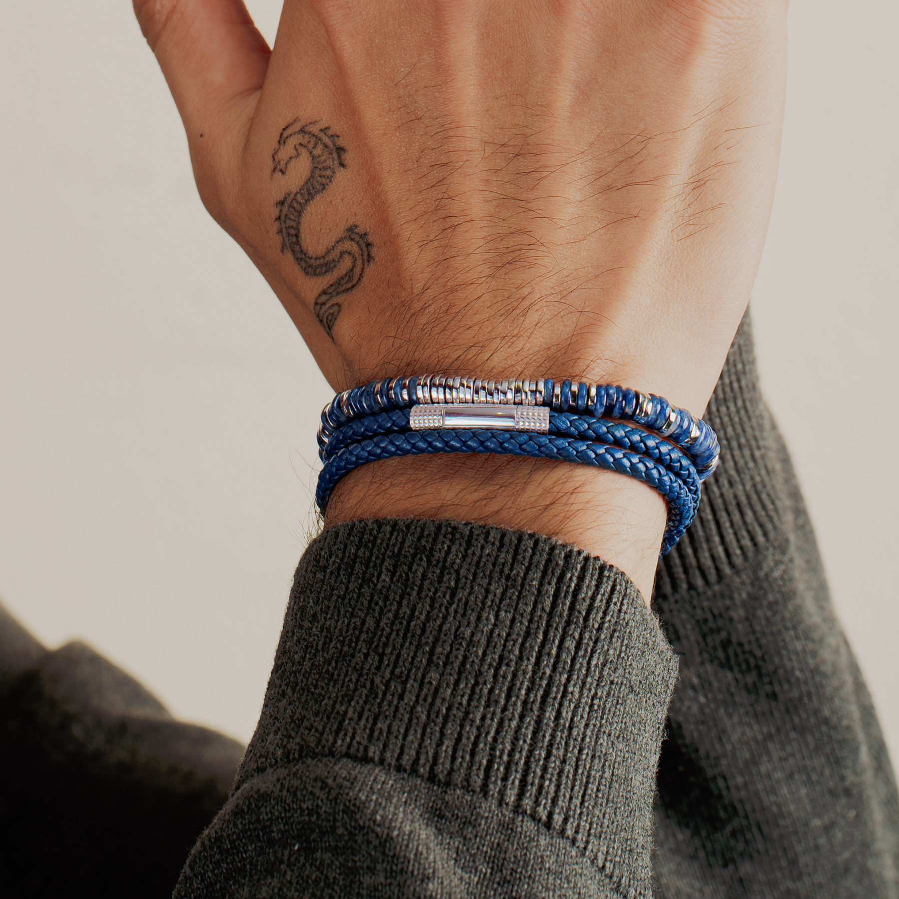 A rhodium-plated sterling silver bracelet with sodalite beads arranged in a pattern that resembles a starry night sky.