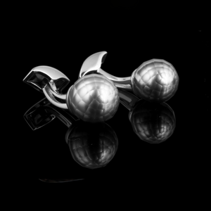Black faceted pearl cufflinks in 18k white gold