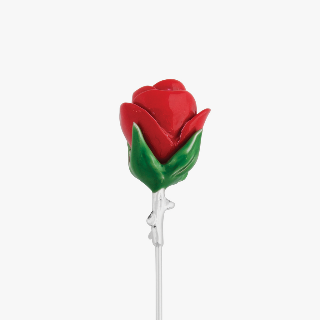 A red rose lapel pin with a palladium plated metal stem and base. 