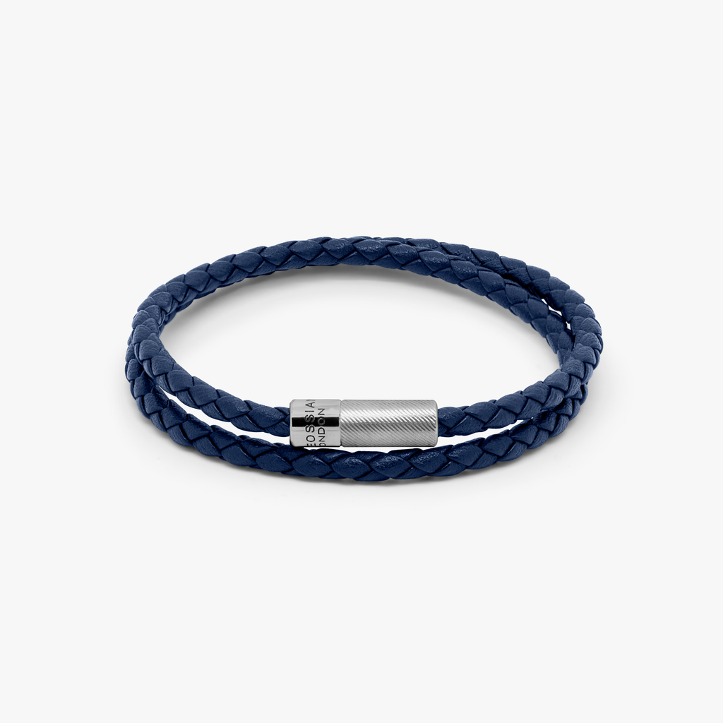 A navy blue double wrap leather bracelet with a sterling silver clasp.