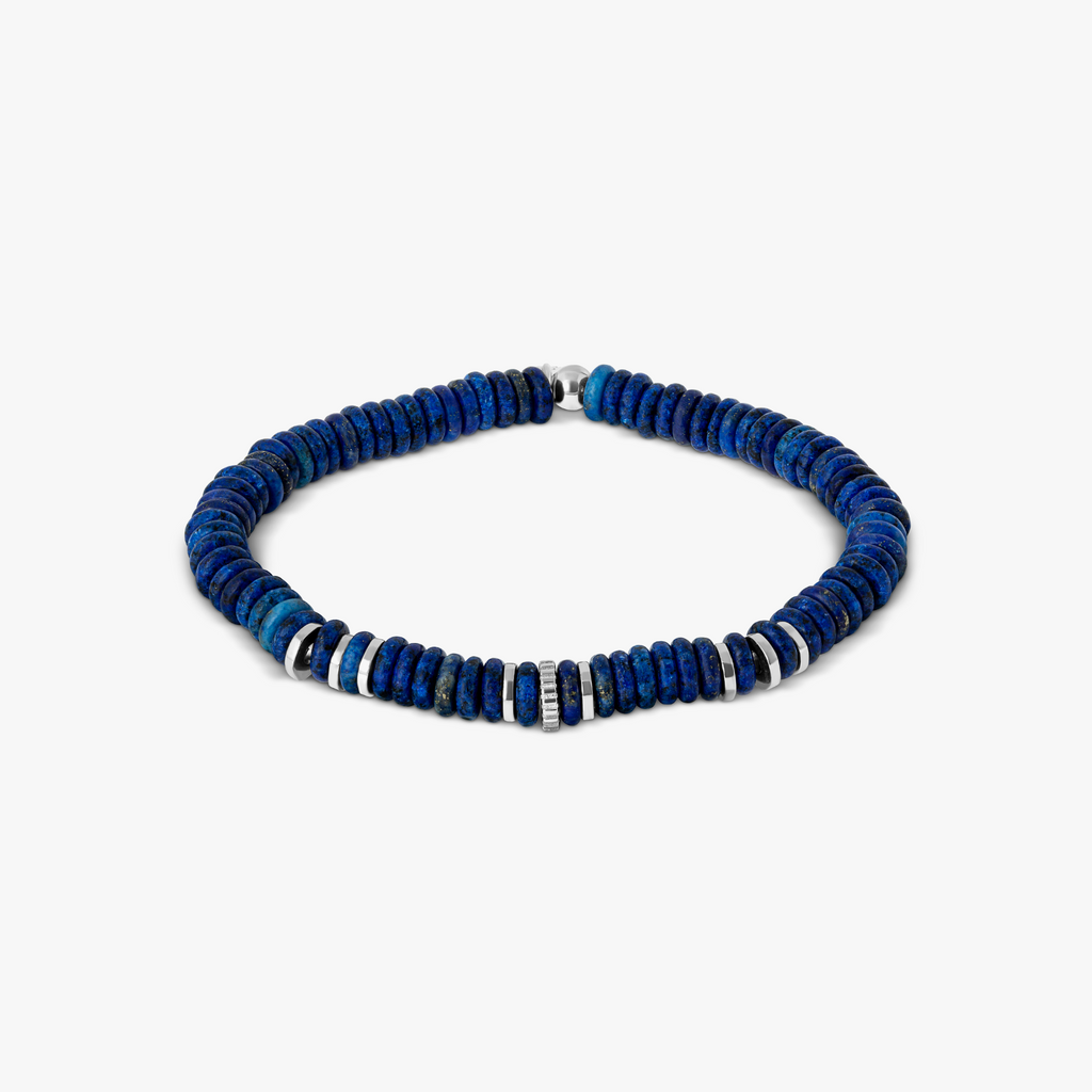 A blue beaded bracelet with rhodium plated sterling silver, featuring rondelle shaped blue lapis lazuli beads and gear discs.